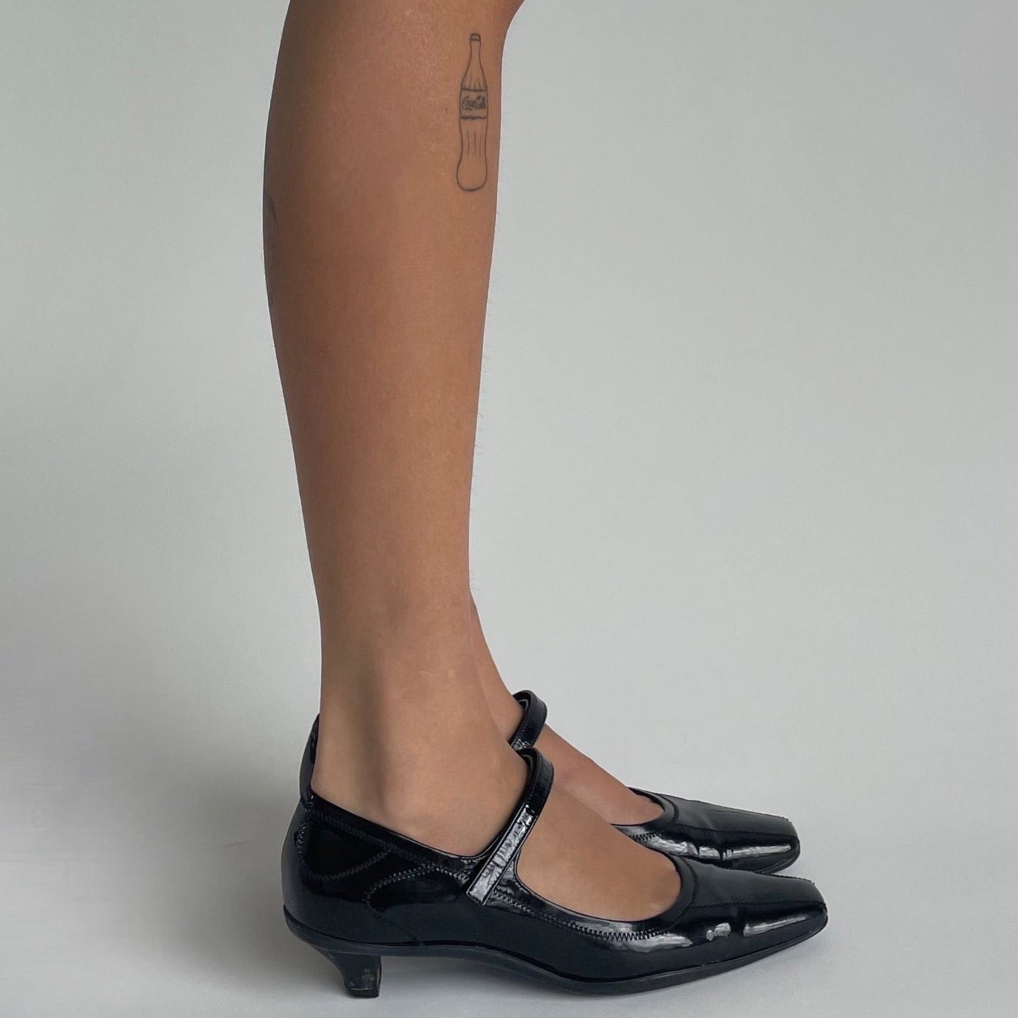prada patent leather kitten heels