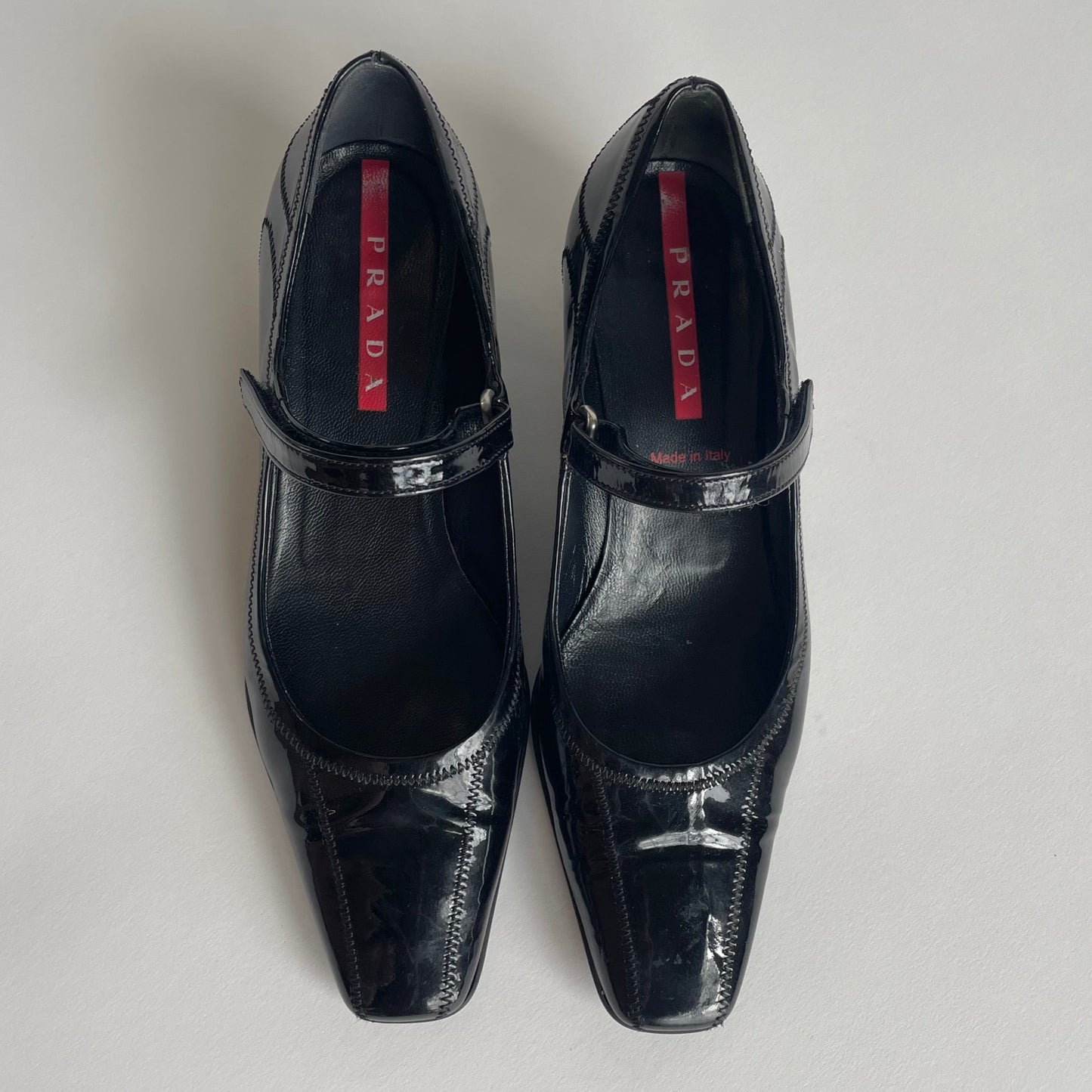 prada patent leather kitten heels