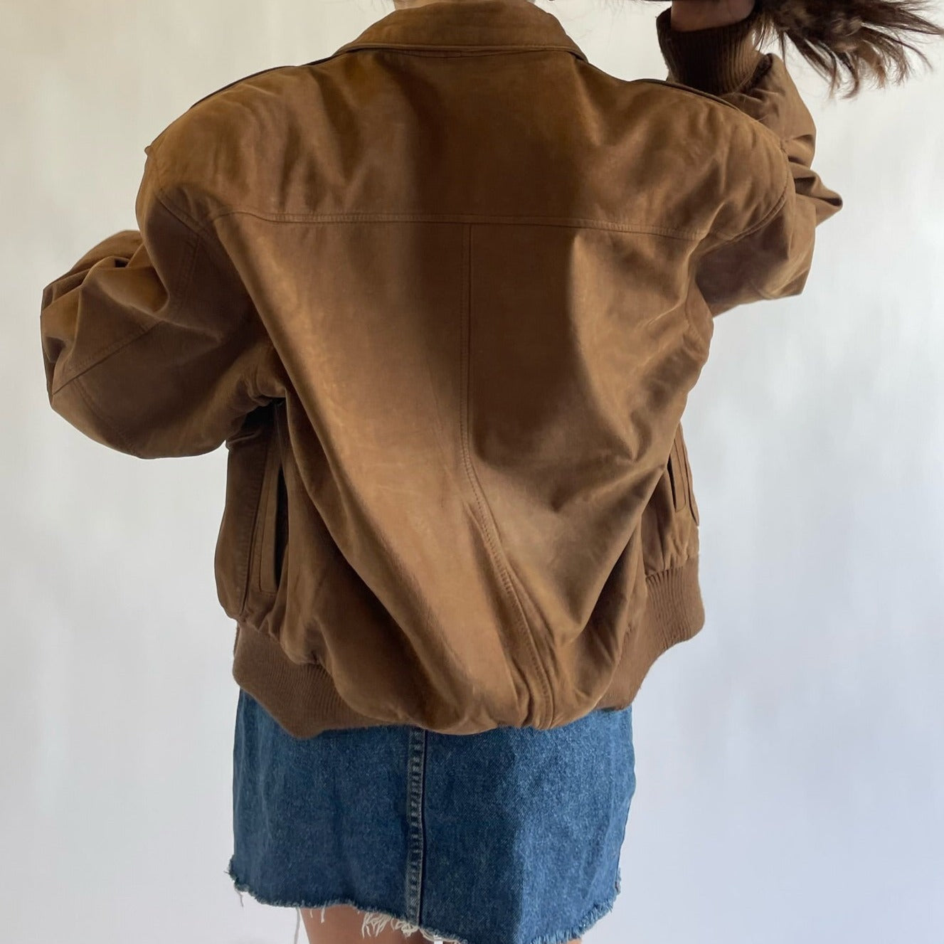 brown bomber jacket