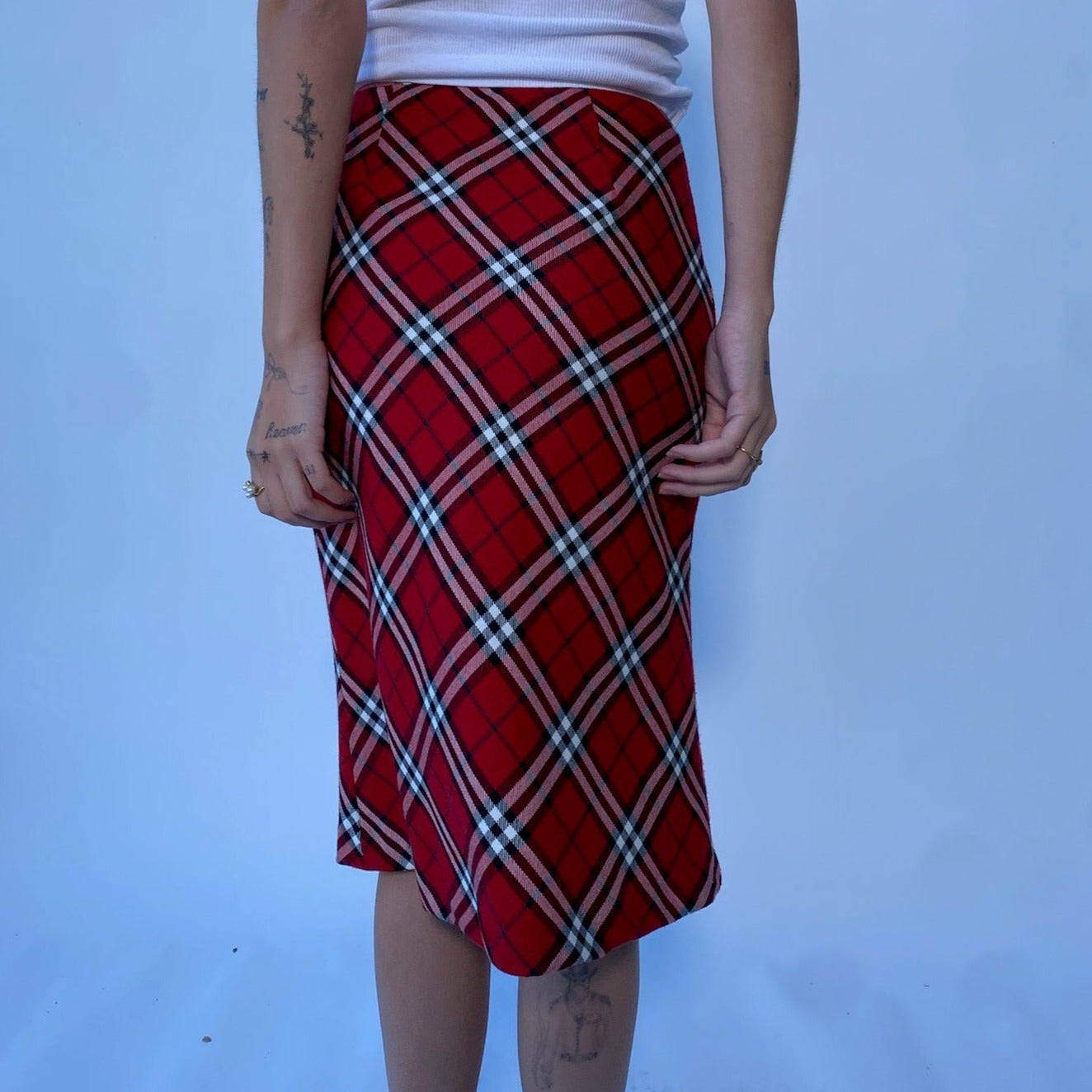 red plaid skirt