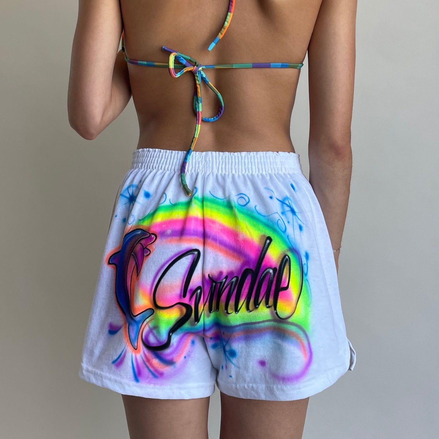 airbrushed white dolphin shorts