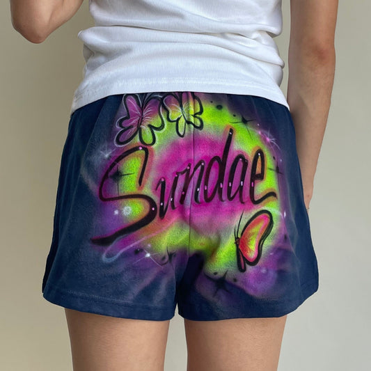 airbrushed navy butterfly shorts